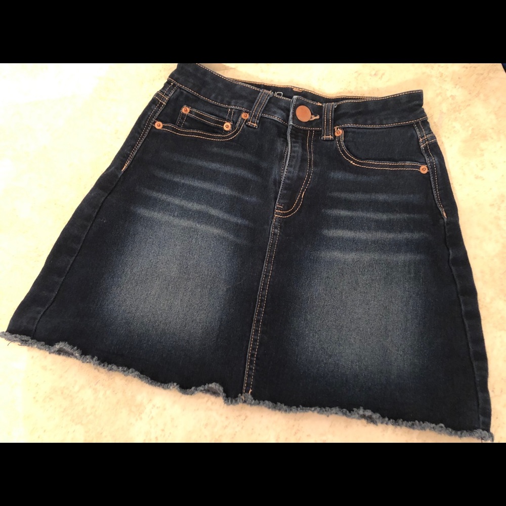Dark denim mini skirt. Size 4